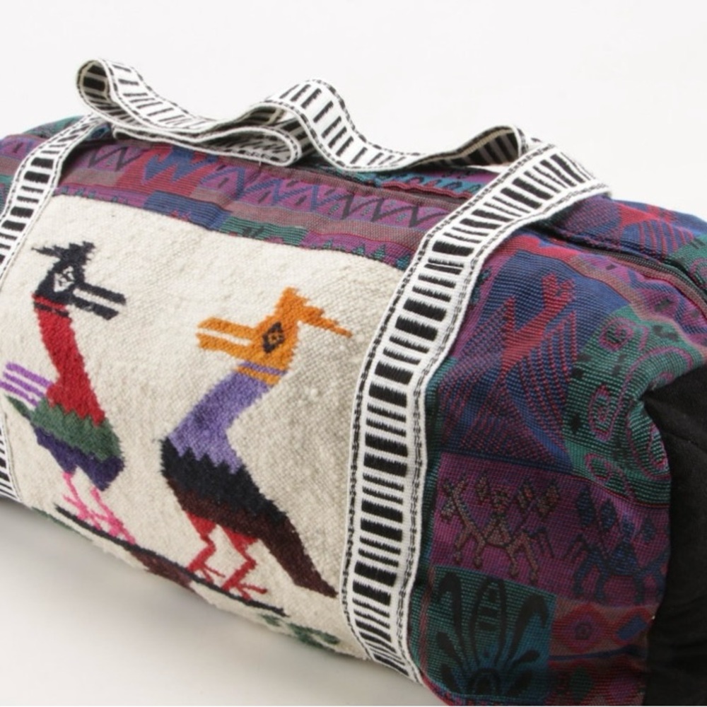 Gorgeous new without tags woven tapestry duffle bag.